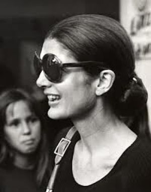 jackie bouvier kennedy onassis with slicked hair ponytail and sunglasses.jpg